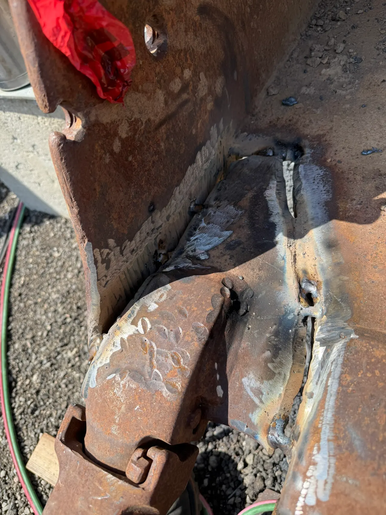 Close-up of repair work at a damaged steel equipment connection